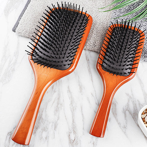 http://www.pureglonaturals.com/cdn/shop/products/Natural-Beechwood-Square-Black-Airbag-Hair-Brush-_4_1200x1200.jpg?v=1640513612